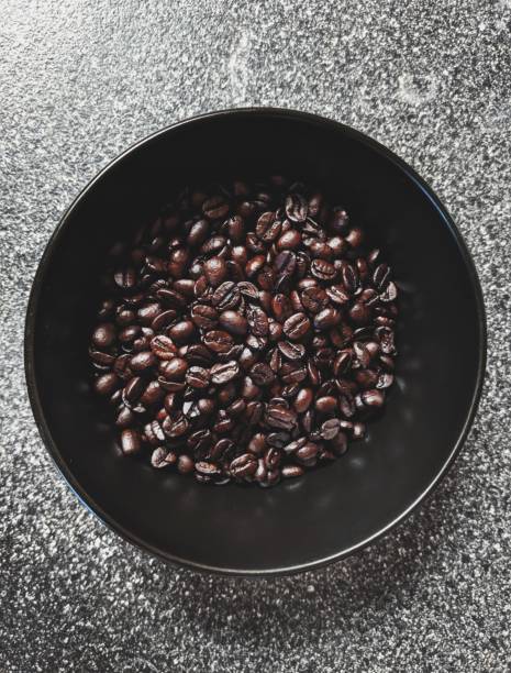 Coffee beans in a black bowl