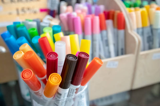 istock stack of coloured felt-tips at market store. selective focus. education and stationery concept. back to school concept. 1165794413