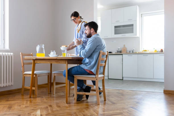 istock Couple Having Breakfast at Home 1165798124