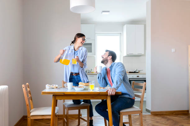 istock Couple Having Breakfast at Home 1165798129