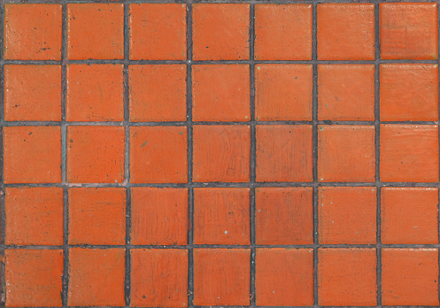 Close up ceramic mozaic floor tiles texture orange color