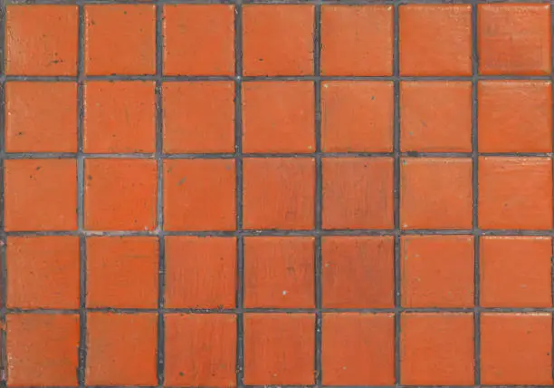 Photo of Orange ceramic mosaic tiles texture