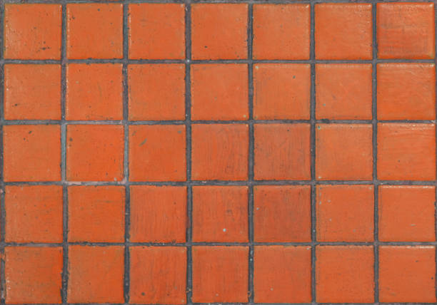 текстура оранжевой керамической мозаичной плитки - paving stone stone brick wall стоковые фото и изображения