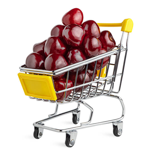 Fresh tasty cherry in the shopping cart. stock photo