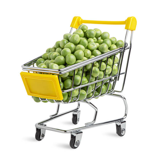 Fresh tasty peas in the shopping cart. stock photo