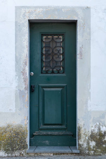 istock Old wooden door 1165804455