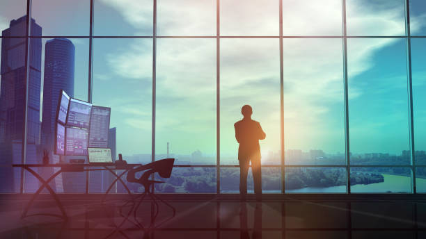 istock Silhouette of a trader in the office 1165807382