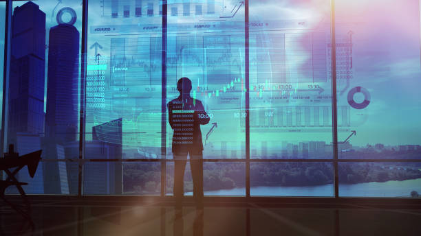 istock Silhouette of a trader in the office before infographics 1165807384