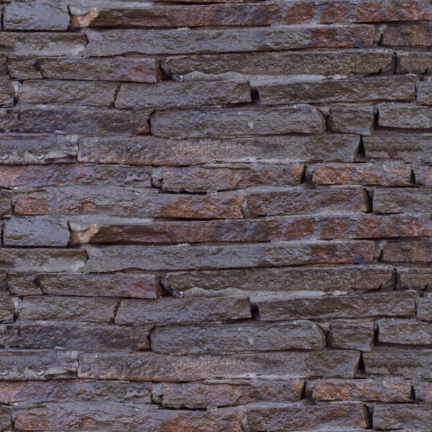 istock Seamless soft focus texture of wet bricks wall. 1165820746