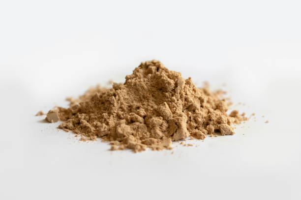 istock Cocoa protein powder isolated over the white background. 1165821991