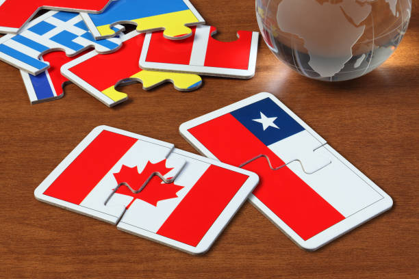 istock Canada and Chile Flags in puzzle 1165822127