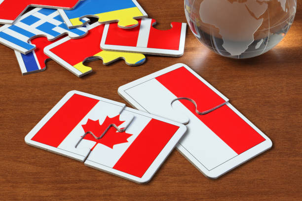 istock Canada and Indonesia Flags in puzzle 1165823176