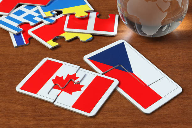 istock Canada and Czech Flags in puzzle 1165823192