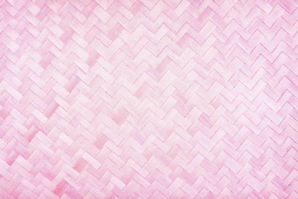Pink wood woven mat nature with line zigzag patterns texture for background