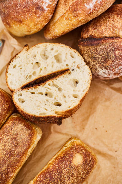 istock Fresh tasty fragrant handmade bread close-up. Homemade baking 1165832645