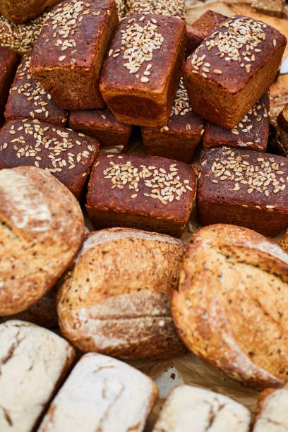istock Fresh tasty fragrant handmade bread close-up. Homemade baking 1165832742