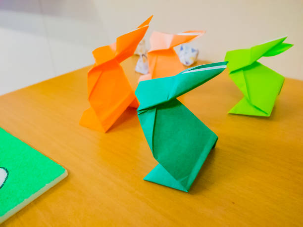 istock rabbit made by colorful origami paper 1165836957