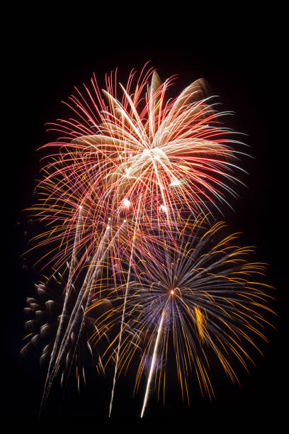 istock Beautiful fireworks display lights up the night time sky 1165840376
