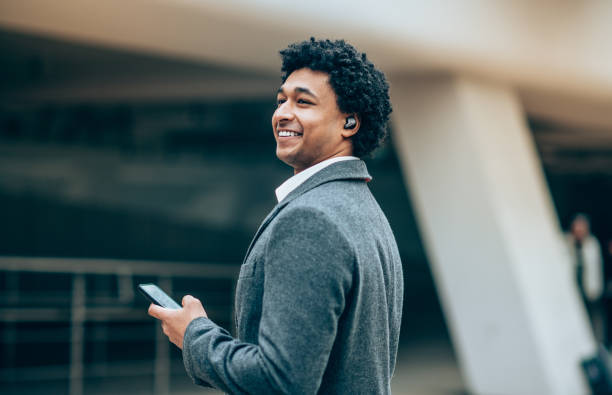 istock Portrait of modern man with Wireless earbuds 1165842053