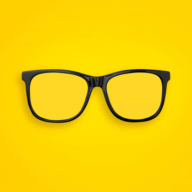 Minimal concept of  transparent glasses flat lay on pastel yellow, orange color paper background. Top view. Copy space Minimal concept of  transparent glasses flat lay on pastel yellow, orange color paper background. Top view. Copy space. tinted sunglasses stock pictures, royalty-free photos & images