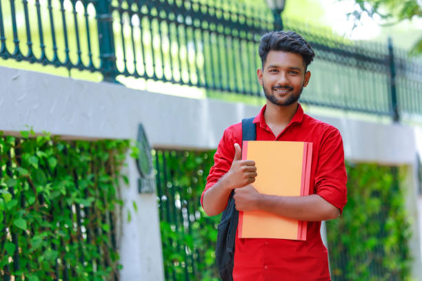 istock College Boy holding with file in hand 1165850450