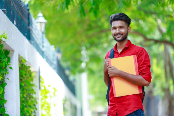 istock College Boy holding with file in hand 1165850484