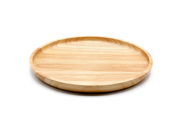istock Empty round wooden plate, isolated on white background. 1165850492