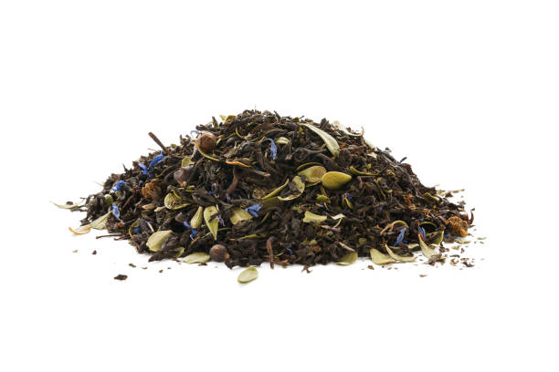 istock Dry black tea mixed with herbs, flower petals and berries. 1165851425