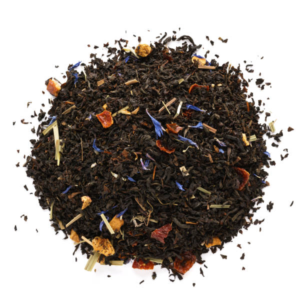istock Dry black tea mixed with herbs, fruits and berries. 1165851452