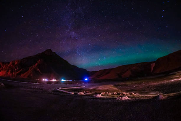 istock Of Iceland Aurora and mountain silhouette 1165854364