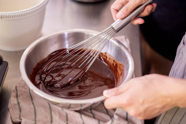 istock Beautiful woman is making bakery 1165855221