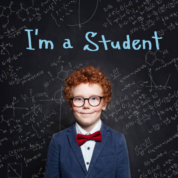 istock Wunderkind kid student in classroom. Back to school concept 1165858636