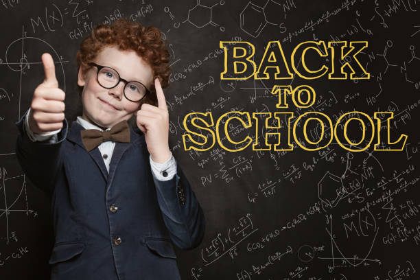 istock Young boy student having fun. Back to school concept 1165858646