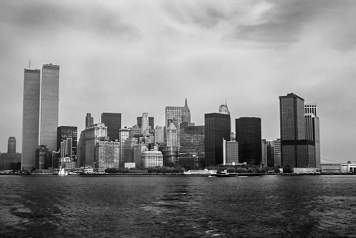 Twin Towers NYC. Archival and historical cityscape of New York skyline from Hudson River with World Trade Center. Lower Manhattan in NYC, United States. Vintage shot in black and white.