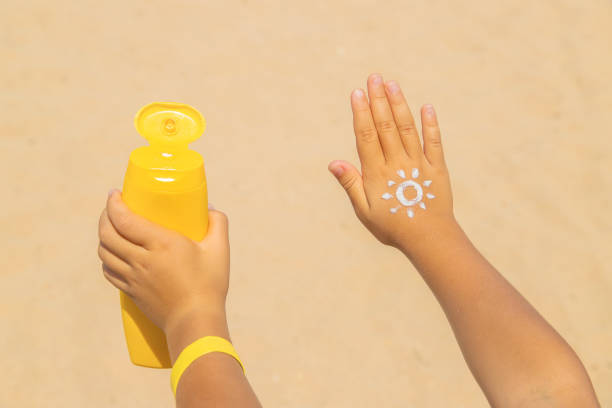 istock Sunscreen on the skin of a child. Selective focus. 1165864025