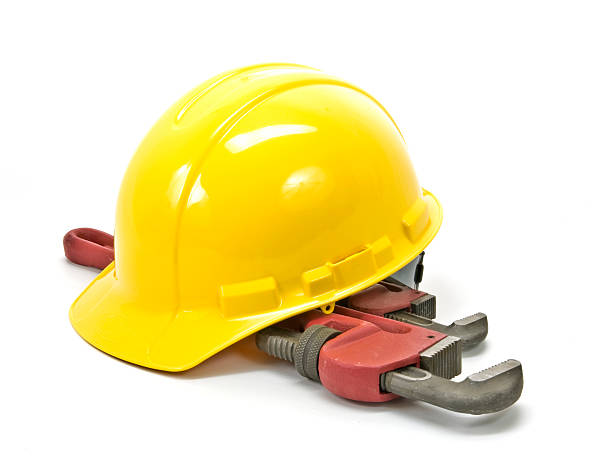 istock Yellow Hardhat  (Hard Hat), Plumber's Wrenches, Isolated on White 116586589