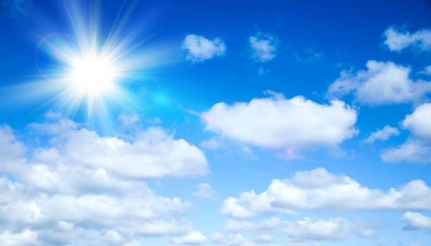 istock Sunny background, blue sky with clouds and sun 1165866025
