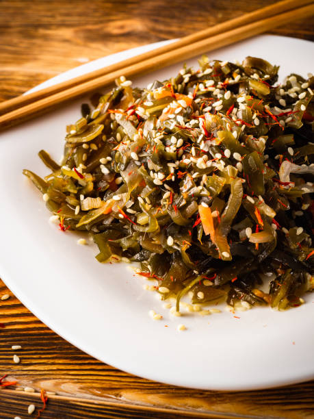 istock Seaweed salad with sesame seeds is on a white plate 1165866719