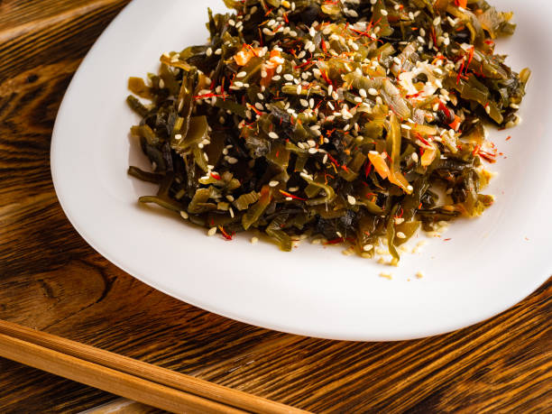 istock Seaweed salad with sesame seeds is on a white plate 1165866757