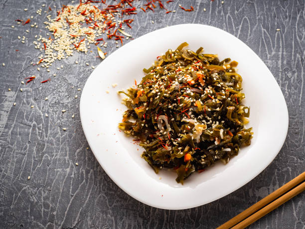 istock Seaweed salad with sesame seeds is on a white plate 1165866781