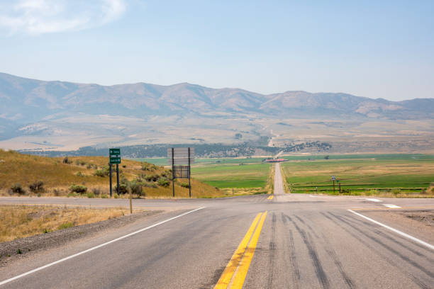 istock asphalt road in Yellowstone National Park 1165868368