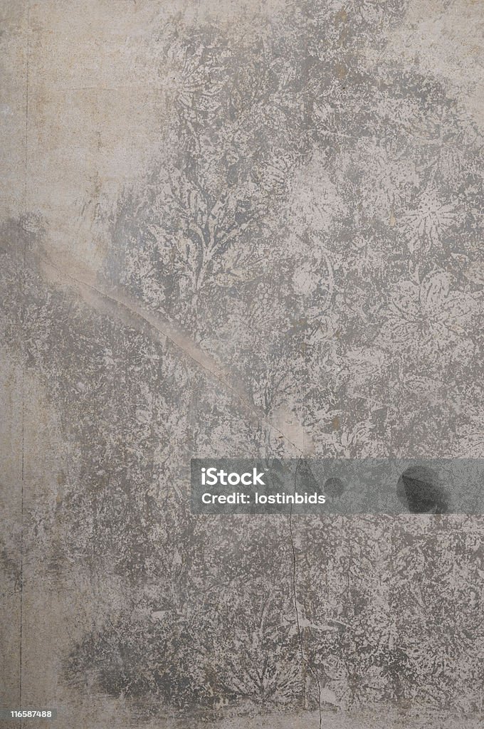 Background - Stripped Wall stained by Old Wallpaper A grunge background.  A stripped wall with an interesting pattern left from old removed wallpaper, in an old house under going restoration. Abstract Stock Photo