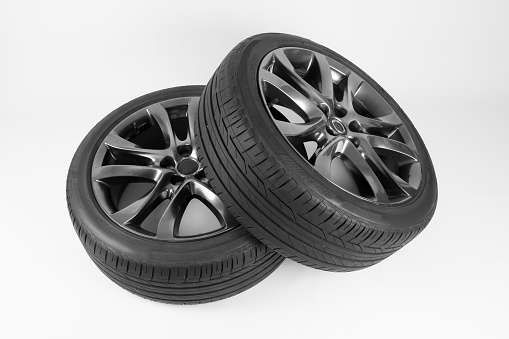 isolated tires and wheels for the car  on a white background