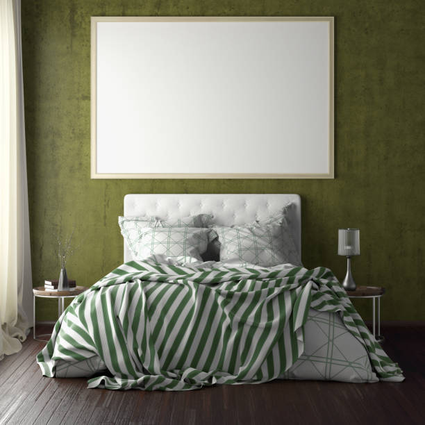 istock poster frame mockups above the bed on the wall in bedroom 1165875155