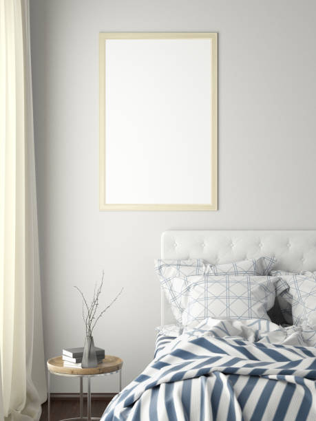 istock poster frame mock up on the wall in bedroom 1165875196