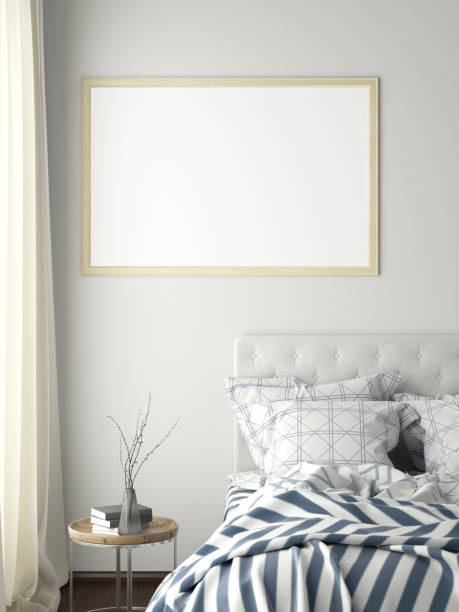 istock poster frame mock up on the wall in bedroom 1165875209