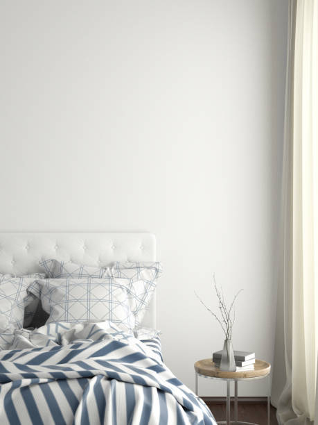 istock poster frame mock up on the wall in bedroom 1165875227