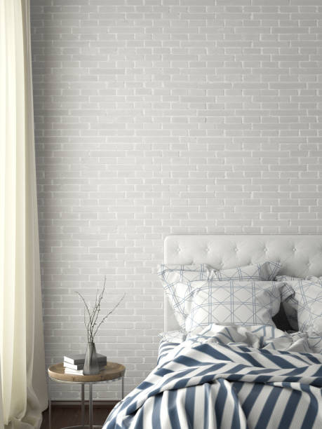 istock poster frame mock up on the wall in bedroom 1165875249
