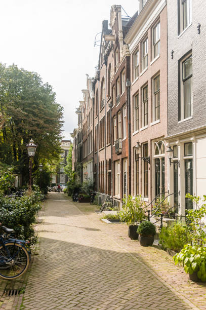 istock Pretty Dutch street in Amsterdam 1165878512