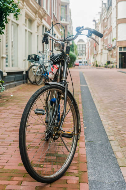 istock Bicycle parked outside a house in the Netherlands 1165878629